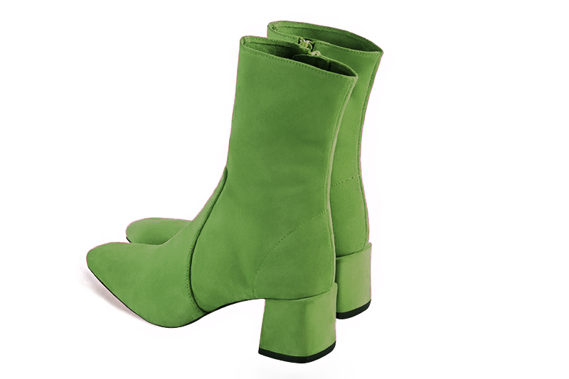 Grass green women's ankle boots with a zip on the inside. Square toe. Medium block heels. Rear view - Florence KOOIJMAN